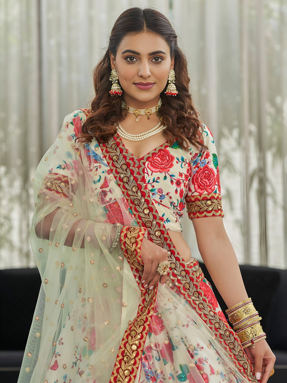 White Floral Lehenga Choli with Red Roses and Gold Embroidered Dupatta