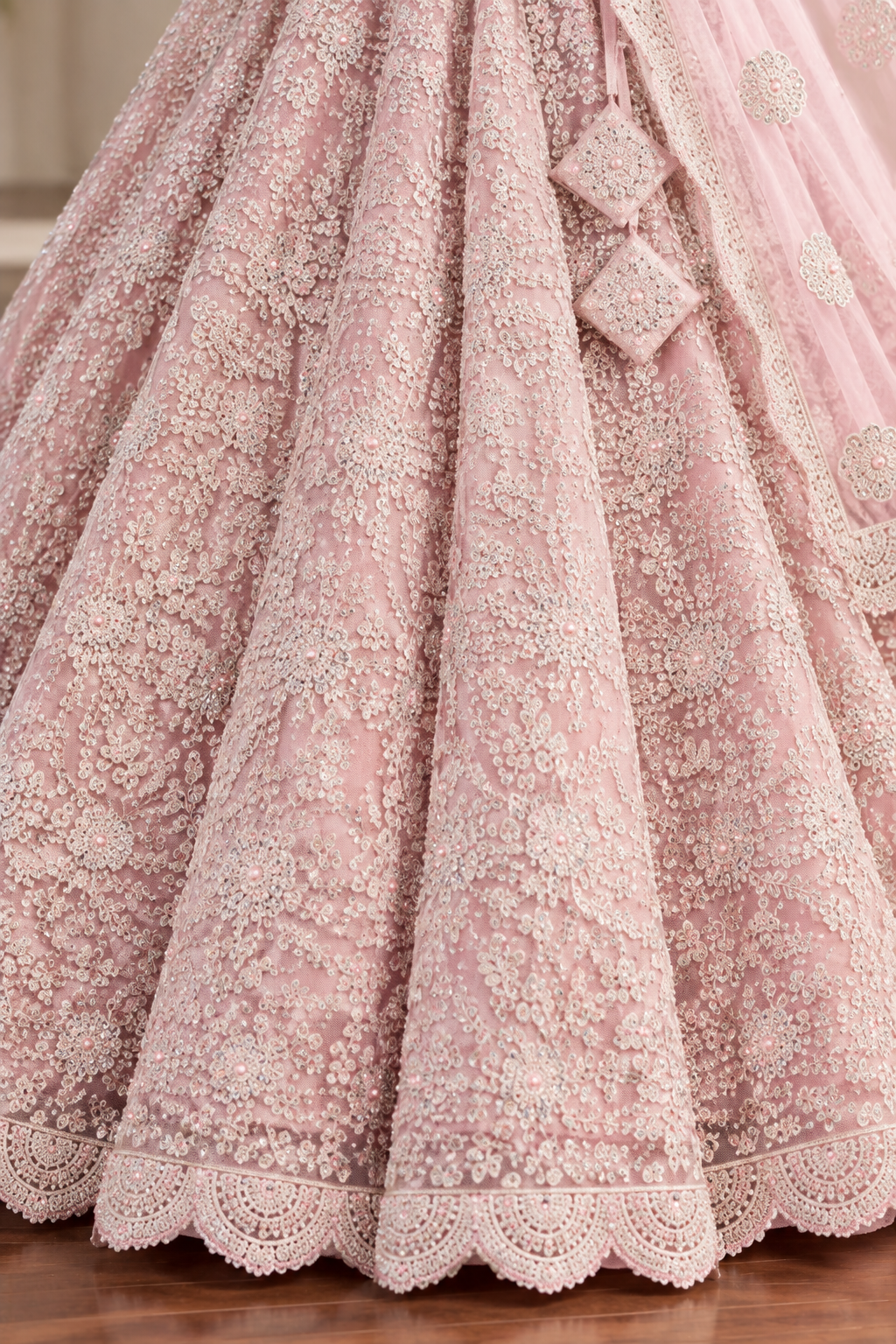 Blush Pink Net Lehenga with All-Over Elegant Embroidery