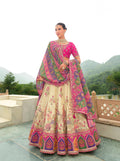 Cream & Pink Embroidered Lehenga Choli with Net Dupatta