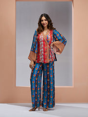 Multicolor printed co-ord set with a wrap-style top and wide-leg pants.