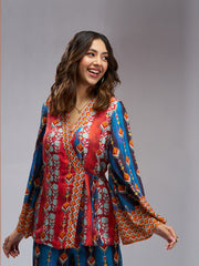 Multicolor printed co-ord set with a wrap-style top and wide-leg pants.