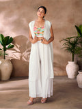 Multicolor embroidered crop top with white SHarara palazzo pants.