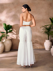 Multicolor embroidered crop top with white SHarara palazzo pants.