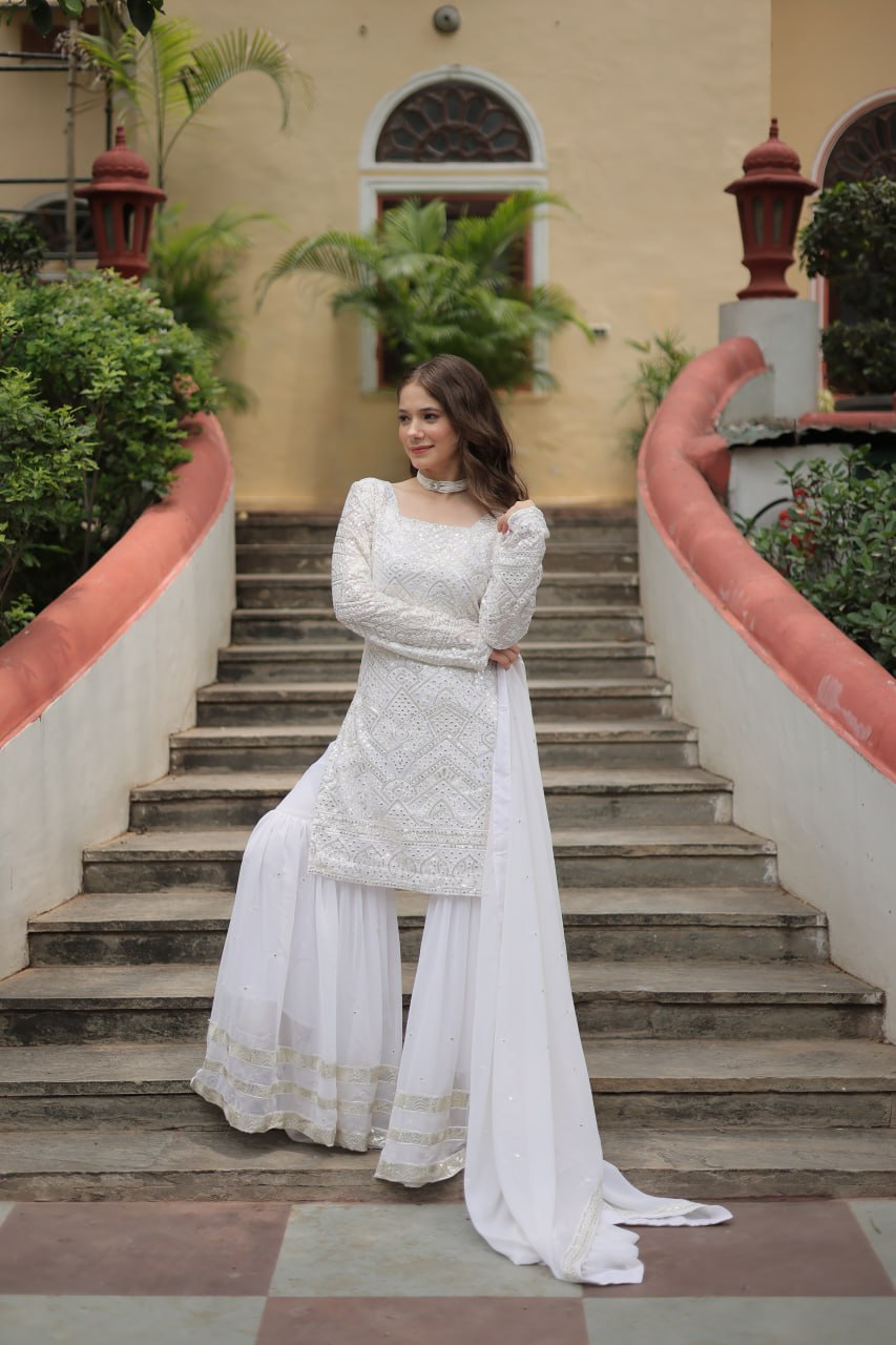 Mesmerizing Faux Georgette Sequins Thread Worked Top Sharara Suit - Ethnicwish