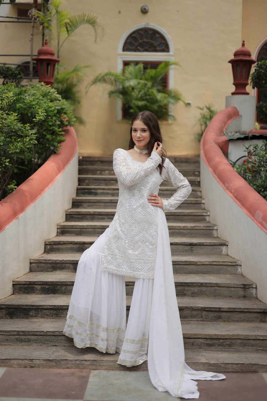 Mesmerizing Faux Georgette Sequins Thread Worked Top Sharara Suit - Ethnicwish