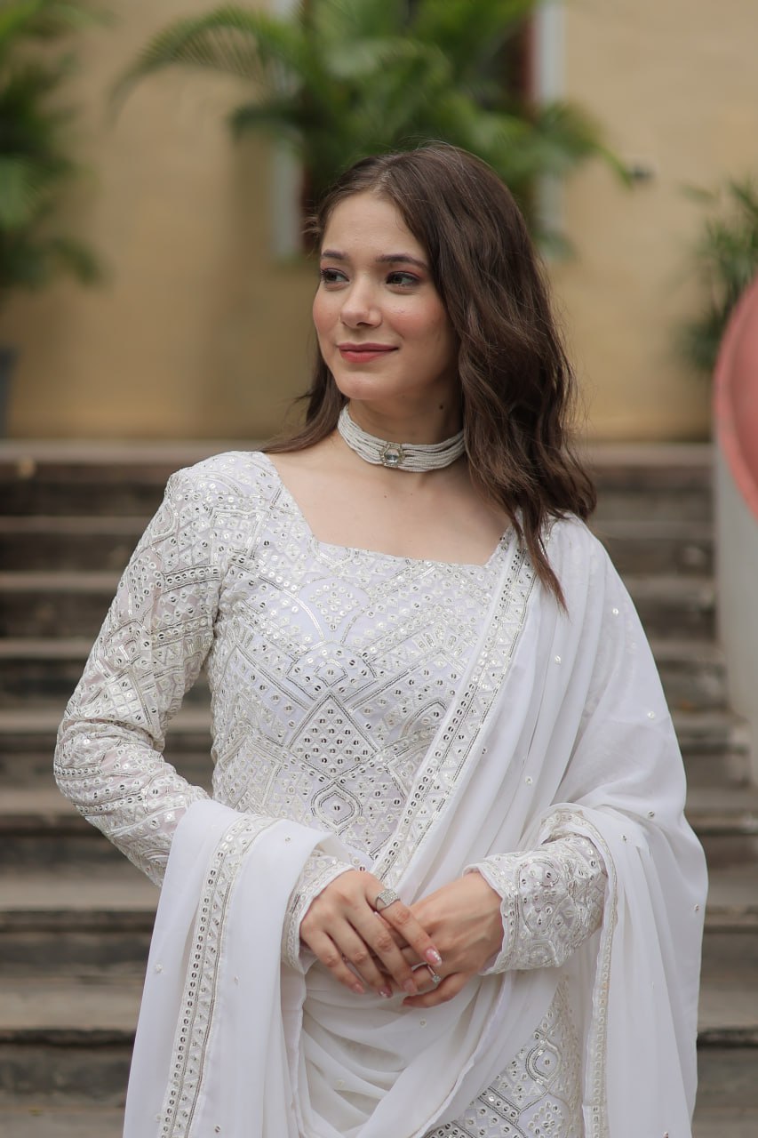 Mesmerizing Faux Georgette Sequins Thread Worked Top Sharara Suit - Ethnicwish
