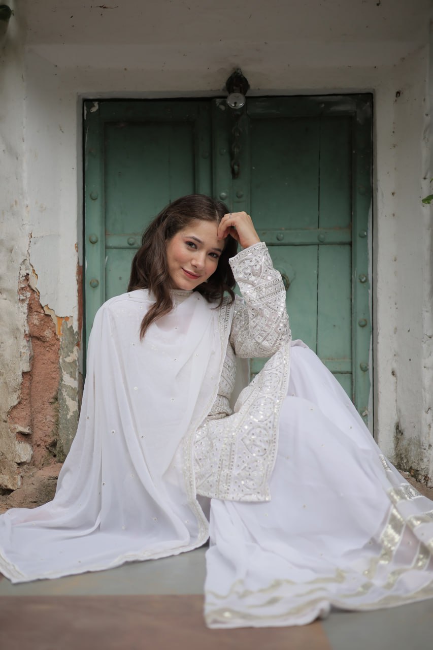 Mesmerizing Faux Georgette Sequins Thread Worked Top Sharara Suit - Ethnicwish