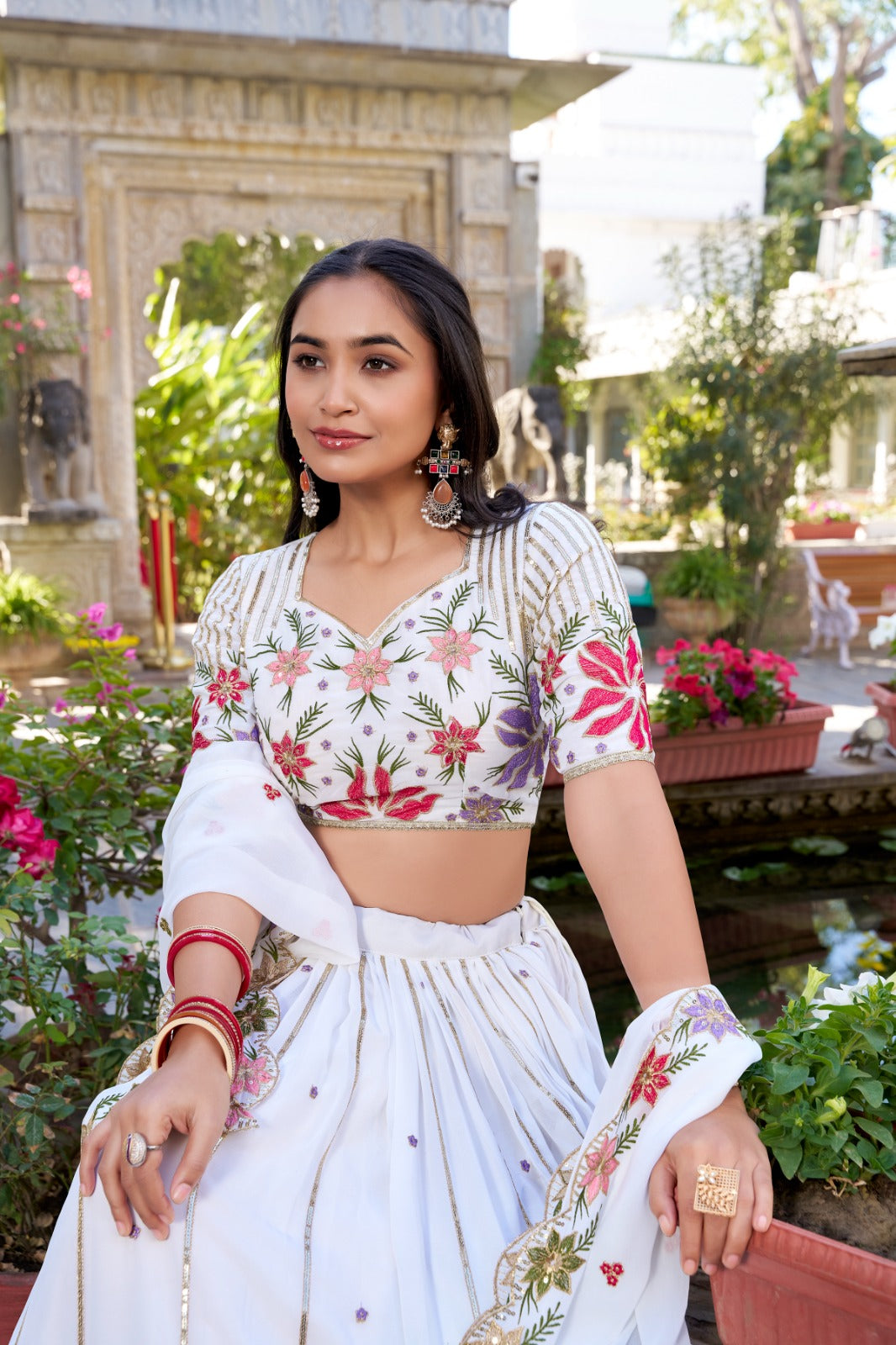 Radiant White Georgette Sequins Thread Worked Lehenga Choli - Ethnicwish