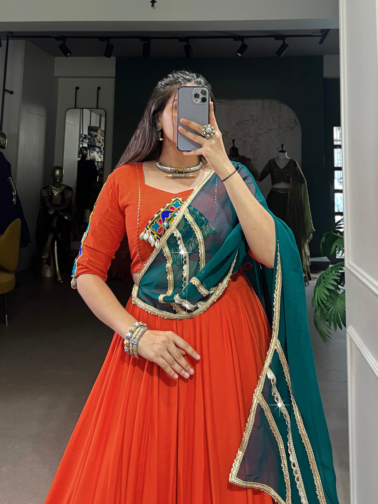 Magnificent Orange Pure Rayon Embossed Navratri Lehenga Choli