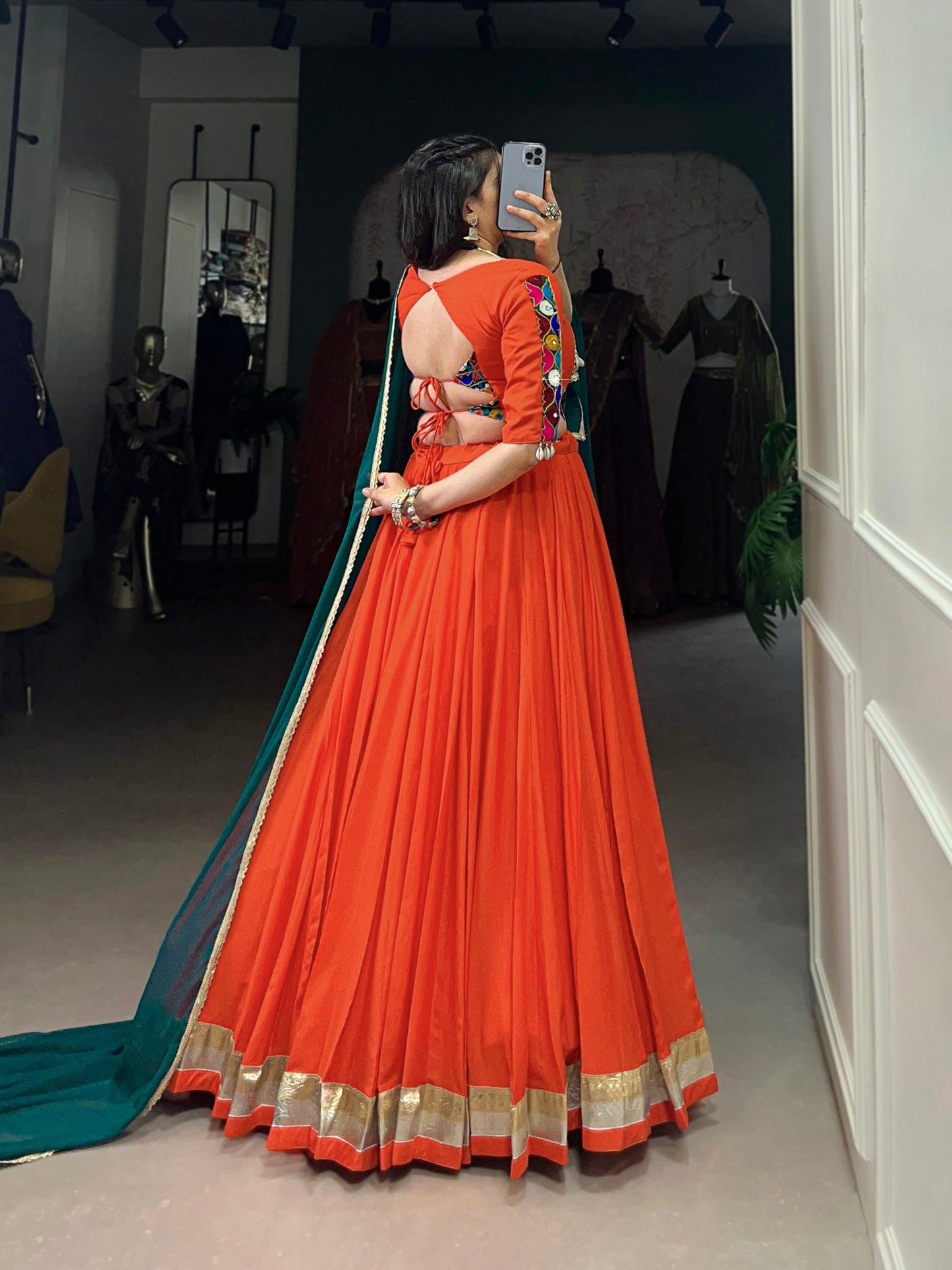 Magnificent Orange Pure Rayon Embossed Navratri Lehenga Choli