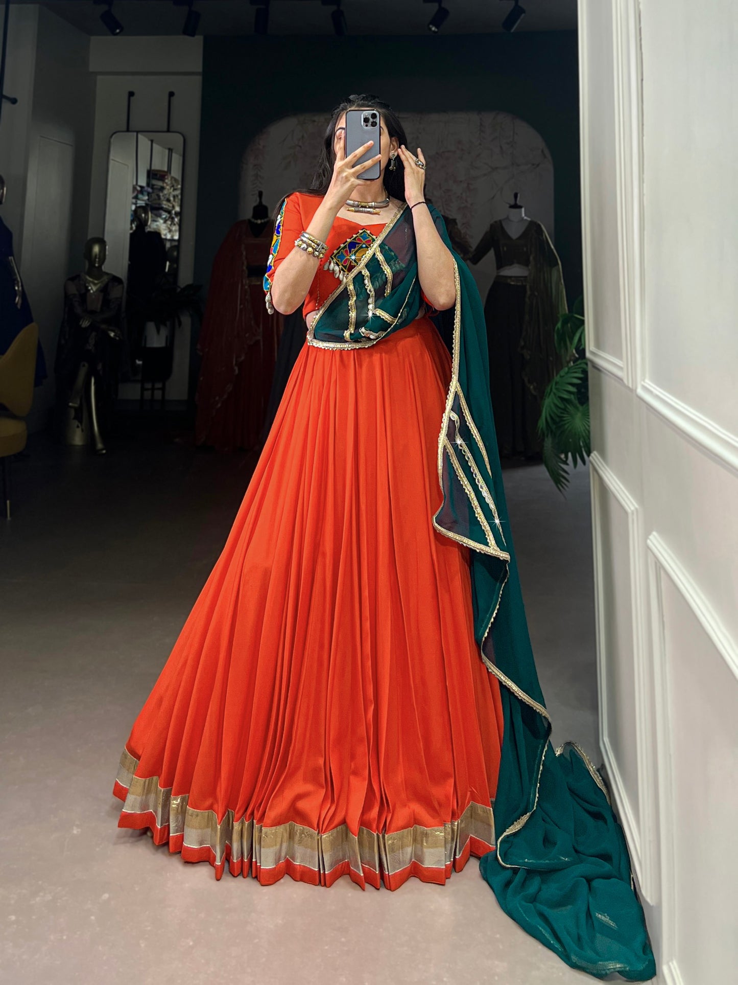 Magnificent Orange Pure Rayon Embossed Navratri Lehenga Choli