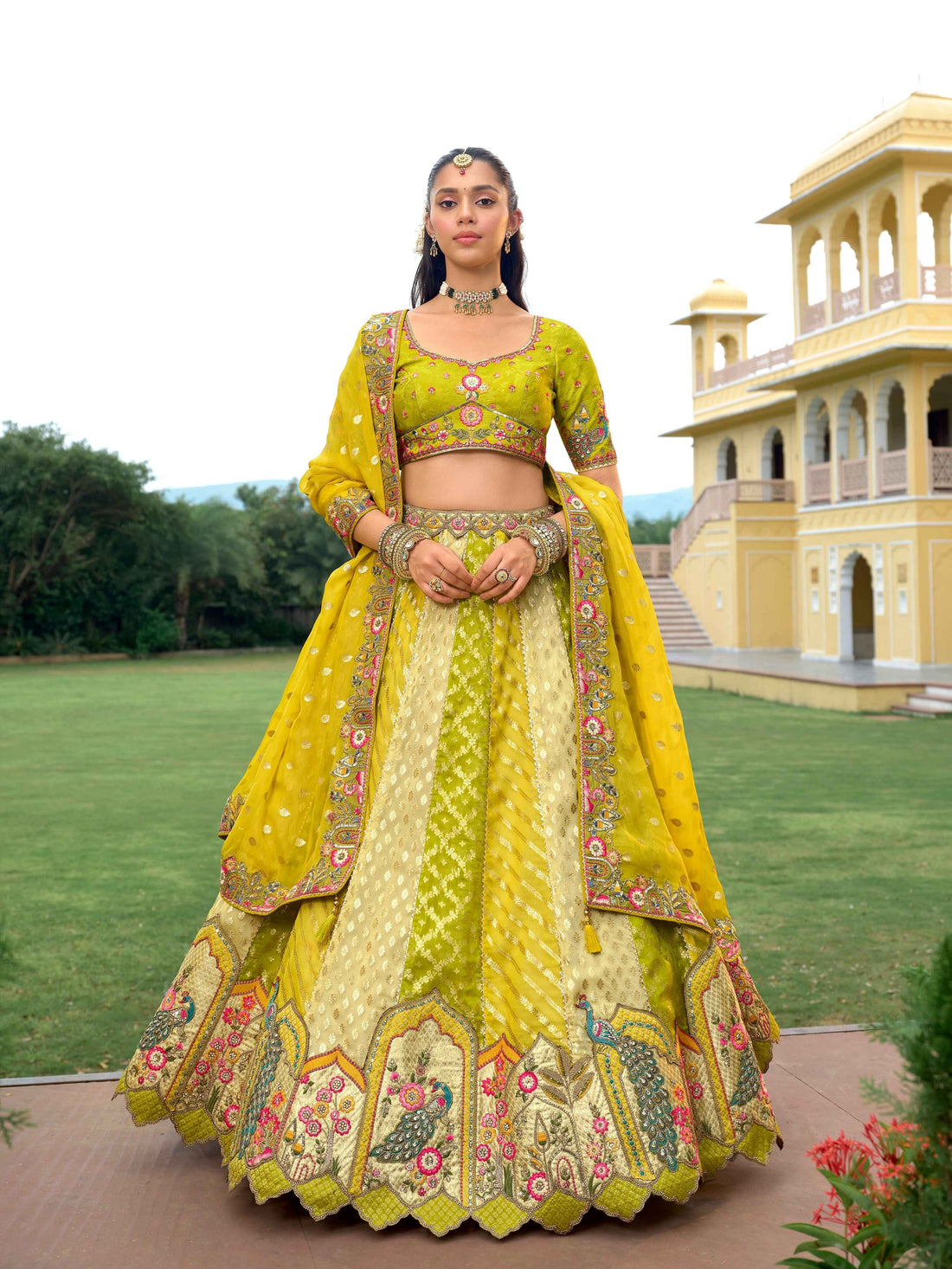 Lime Yellow Heavy Embroidered Silk Lehenga with Designer Net Dupatta