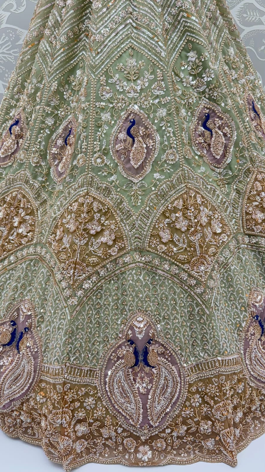 Pista Green Net Peacock Handwork Zari Sequin Lehenga Choli