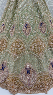Pista Green Net Peacock Handwork Zari Sequin Lehenga Choli