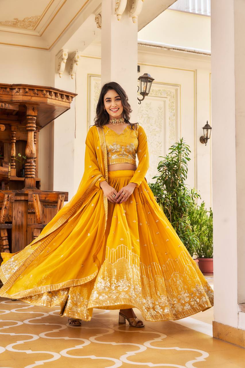 Elegant Faux Georgette Embroidered Lehenga Choli With Matching Dupatta