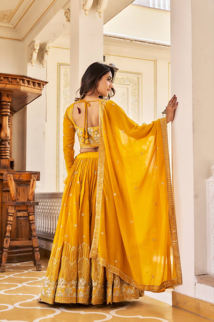 Elegant Faux Georgette Embroidered Lehenga Choli With Matching Dupatta