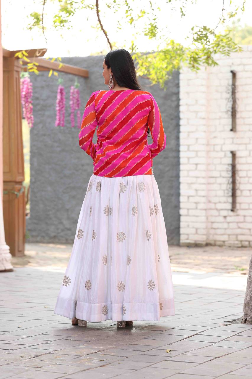 Chinon Gown with Leheriya Jacket – A Fusion of Modern Elegance & Traditional Charm