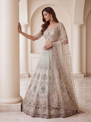 Sky Blue Net Crystal Handwork Zari Embroidered Lehenga Choli