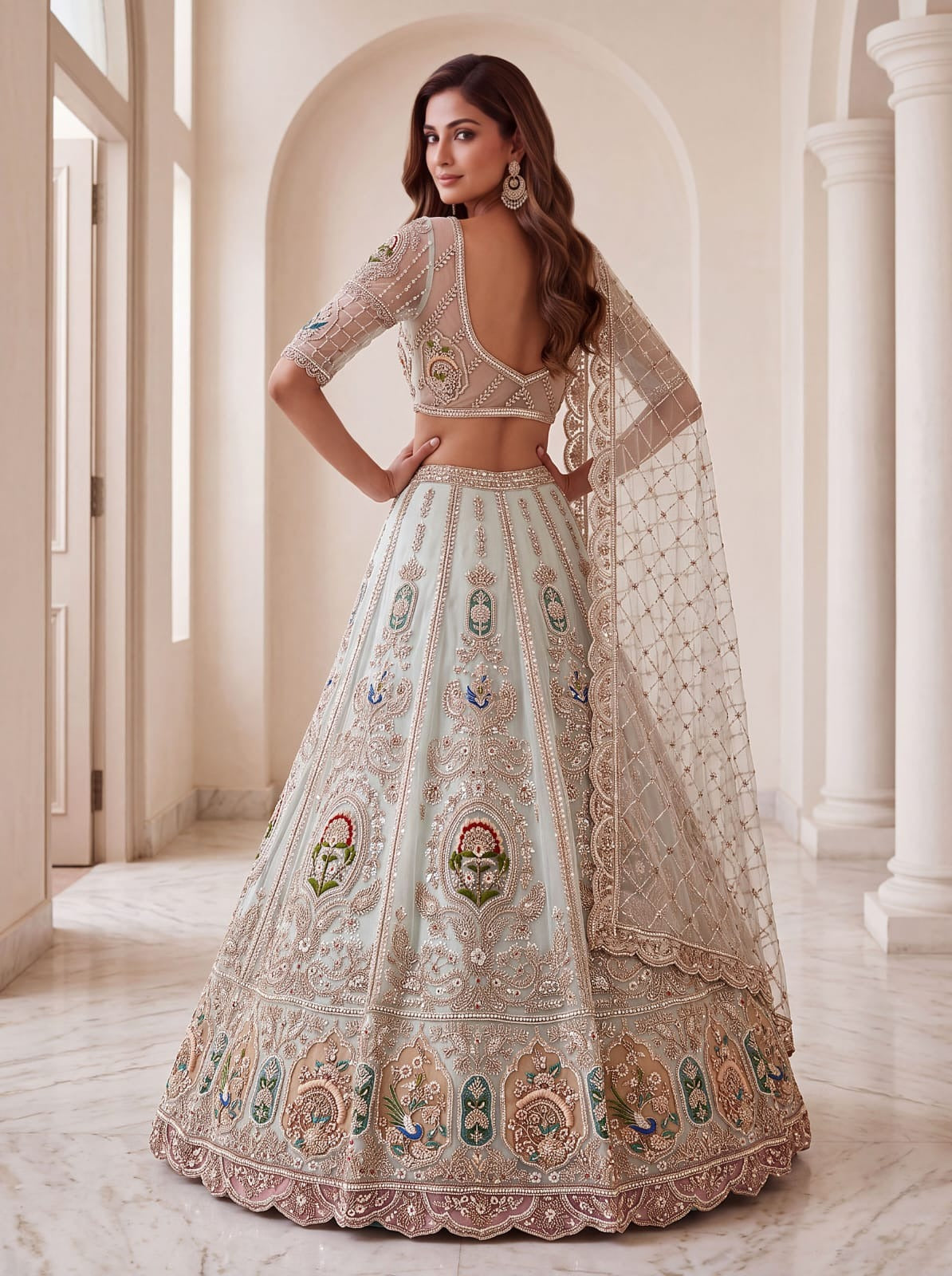 Sky Blue Net Crystal Handwork Zari Embroidered Lehenga Choli