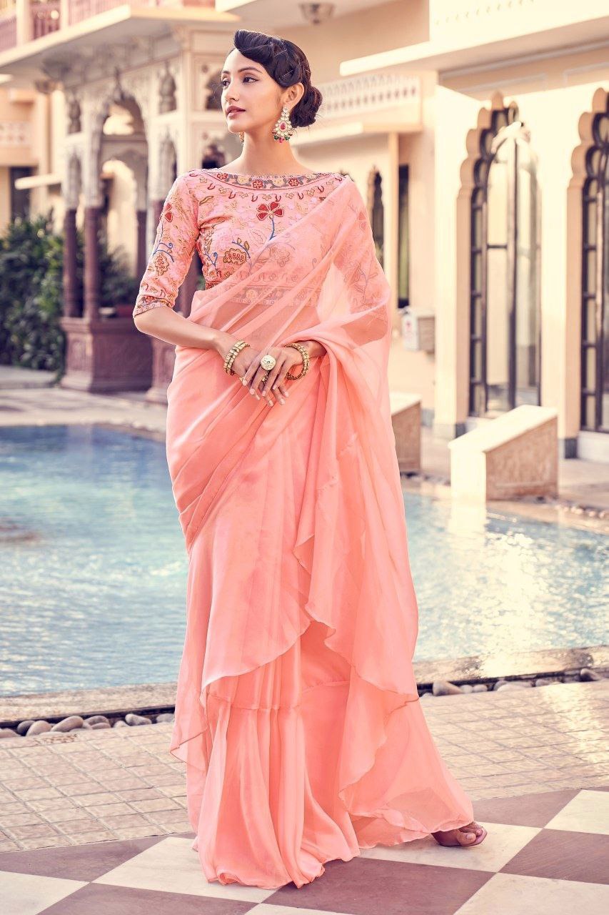 Graceful Peach Pink Organza Saree With Elegant Embroidery